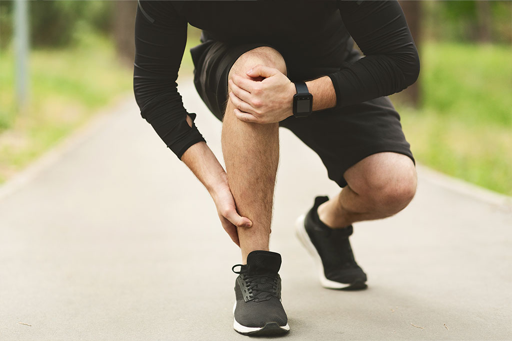 Male runner with chronic knee pain