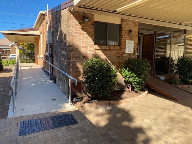 Fully disability-accessible rear entrance ensuring comfortable, easy access for all patients.
