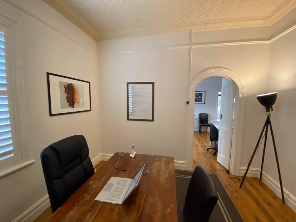 Private practitioner lounge and office space—perfect for admin work or relaxing between client appointments.
